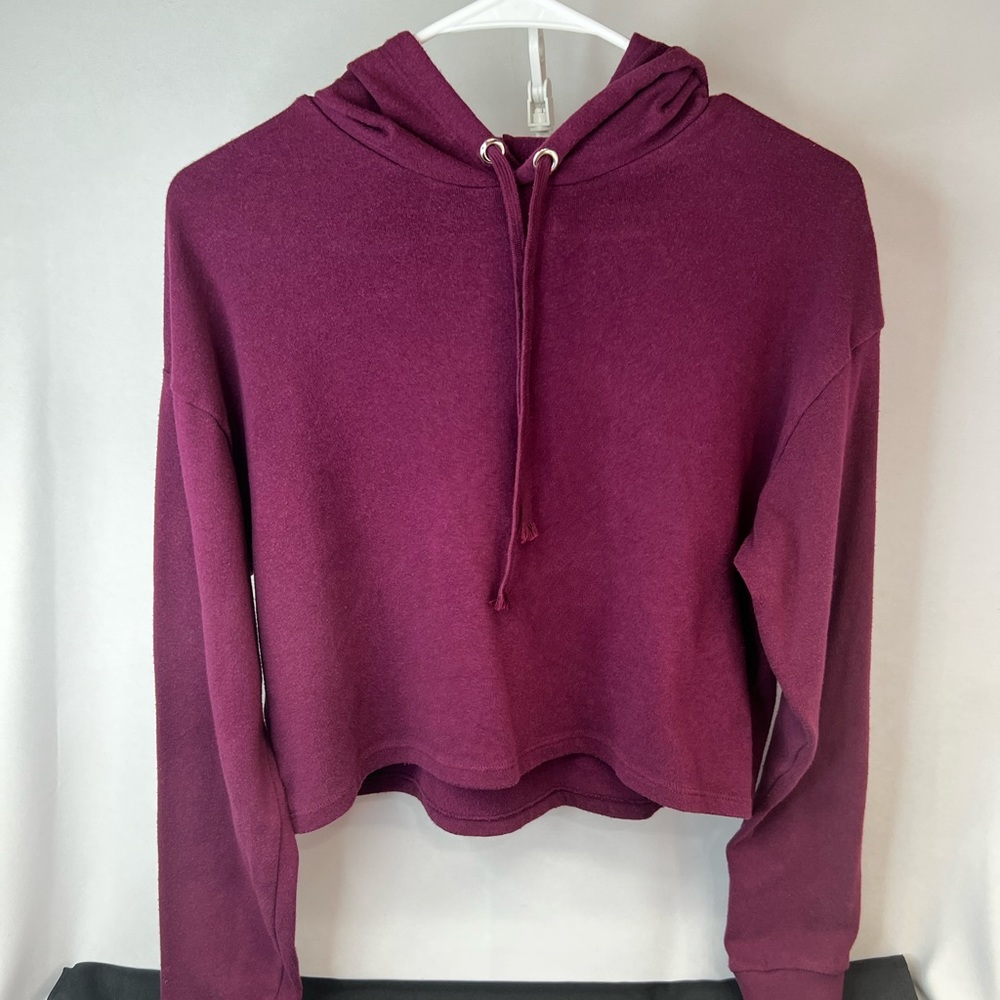 Divide burgundy hoodie pullover style cropped length.  Women’s size S.